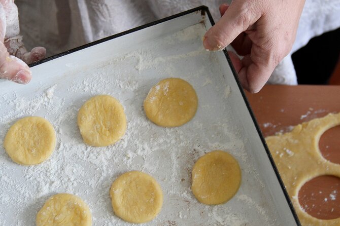 BA: Empanadas and Alfajores Cooking Experience in Palermo - Making alfajores with dulce de leche