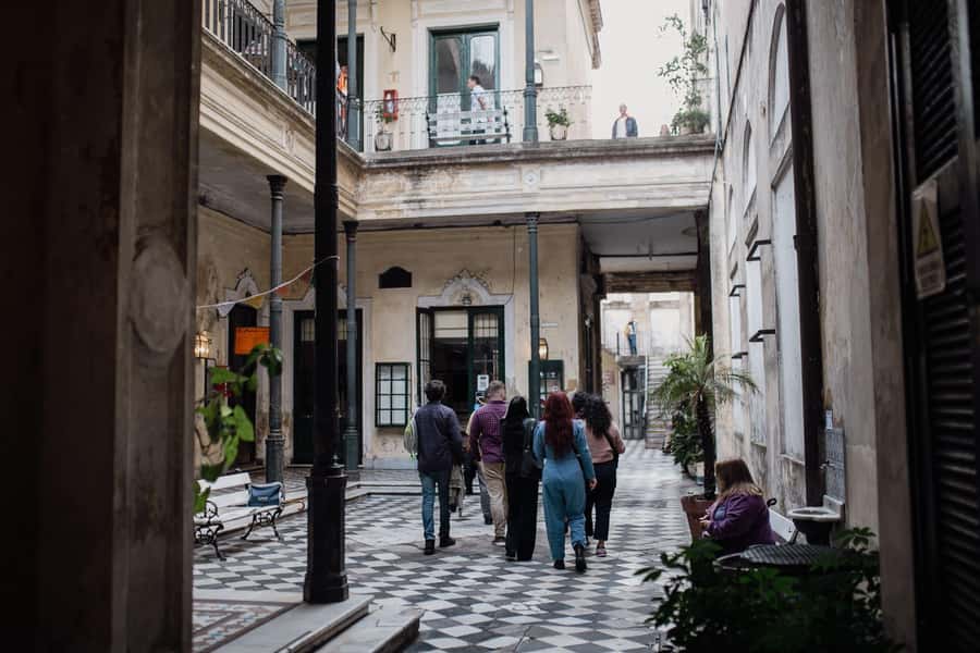 San Telmo: Historical Guided Tour with Street Food & Drinks - Argentine appetizers at a local bodegón