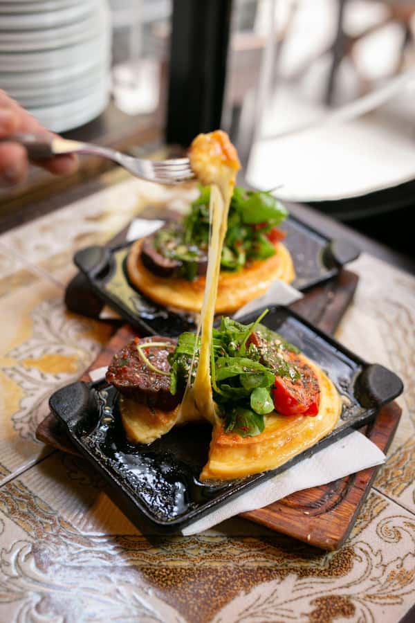 San Telmo: Historical Guided Tour with Street Food & Drinks - Regional specialties and a traditional dessert